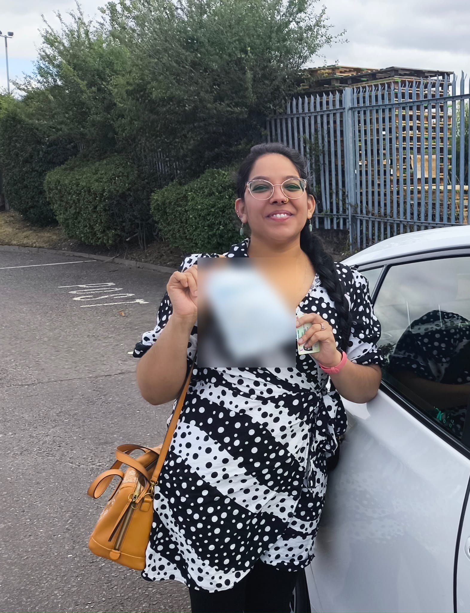 Learner celebrating a driving test pass